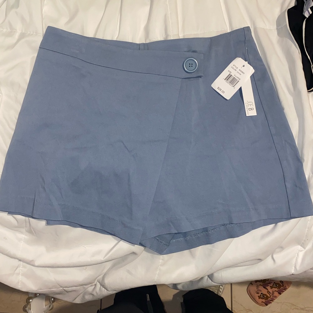 Super stylish Skort! So cute for a night out! Can dress up or down.